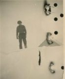 1938 George Shiels on top of snow bank by house