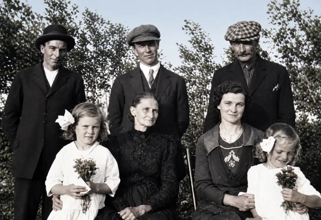 Back row, left to right: Unknown, William Shiels (1886), and Thomas “Tom” Shiels. Front: Kathleen Shiels Zryd, Rachel Shiels, Janet Pollock Shiels, and Christine Shiels Cox. Years later, Christine recognized herself as the little girl at right.