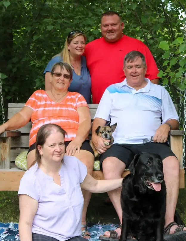 The family in 2024 — Judy and Dan with Tracy, Greg & Jenn